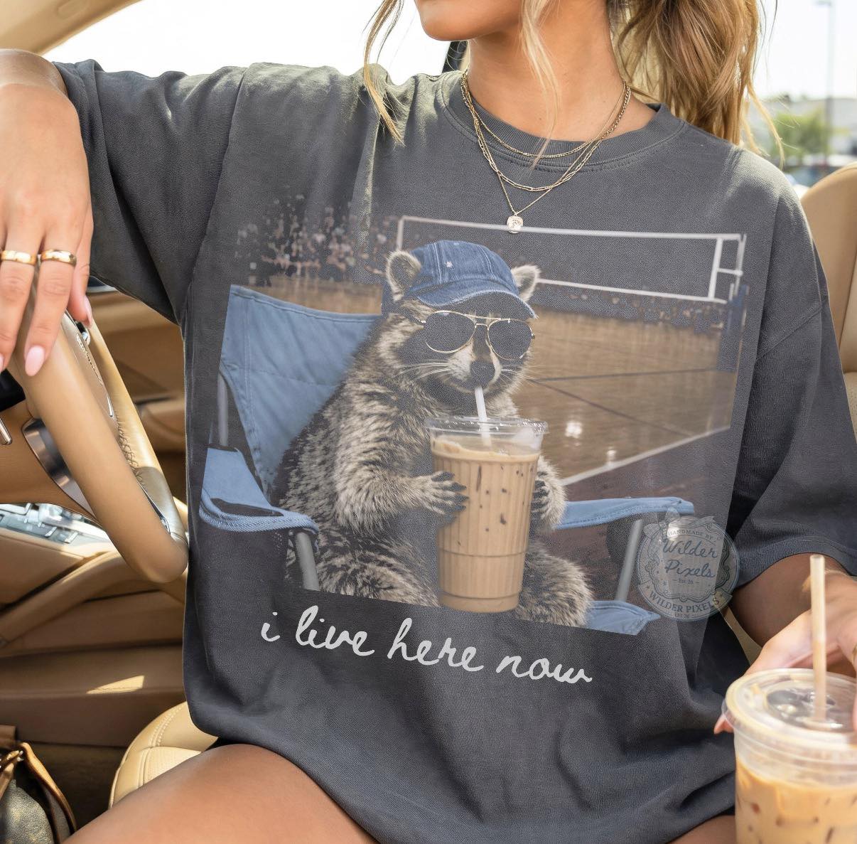 “I Live Here Now” Volleyball Raccoon Graphic Tee