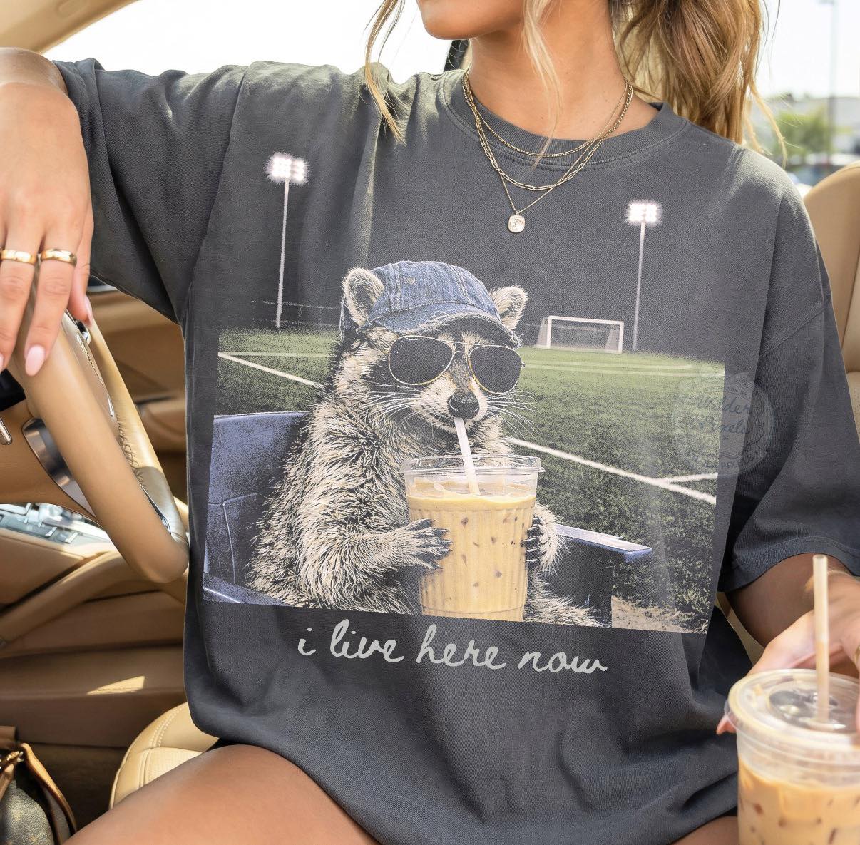 “I Live Here Now” Soccer Raccoon Graphic Tee
