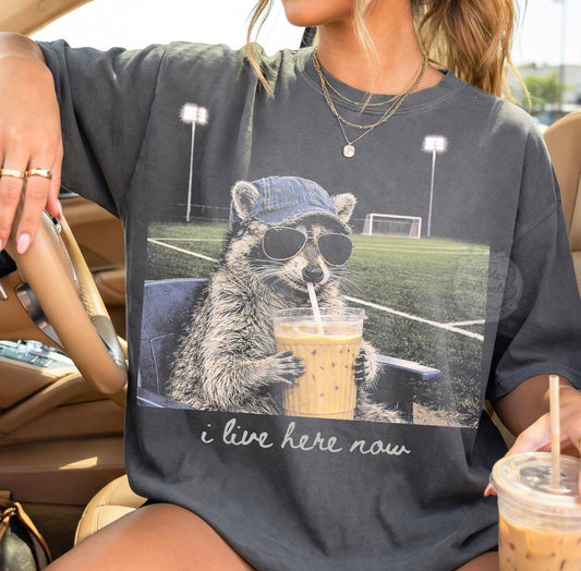 “I Live Here Now” Soccer Raccoon Graphic Tee