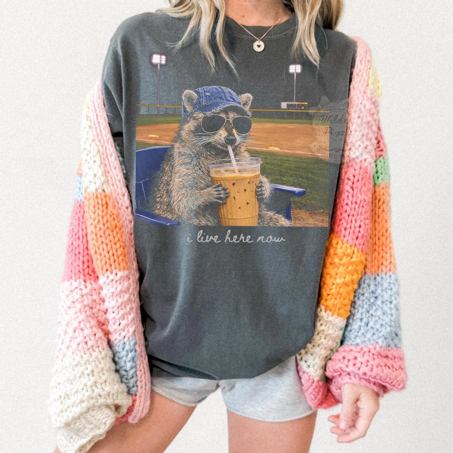 I Live Here Now Raccoon Tee – Softball Edition