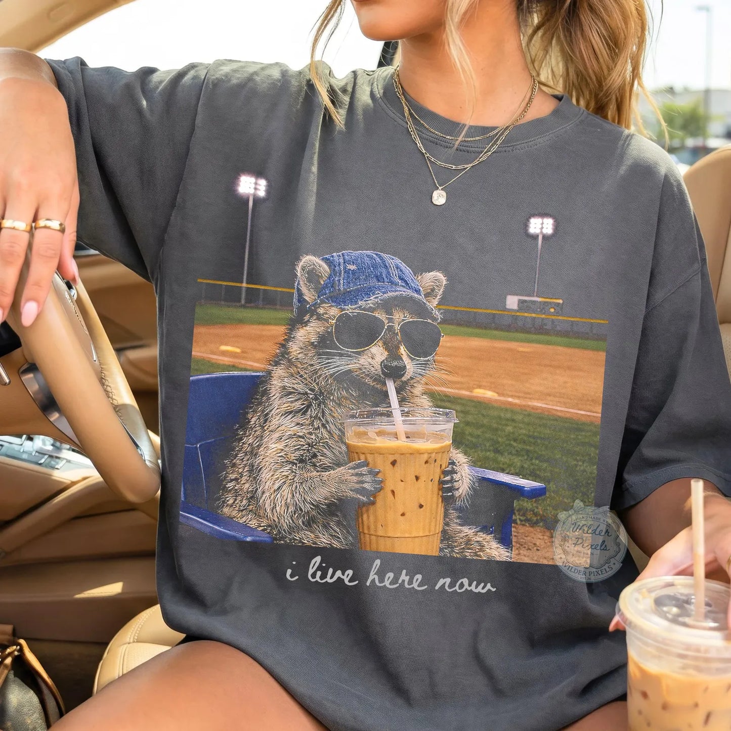 I Live Here Now Raccoon Tee – Softball Edition